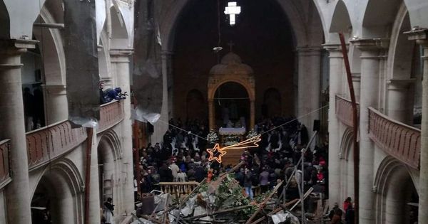 Christmas Mass in ruined
                  church in Aleppo 2016