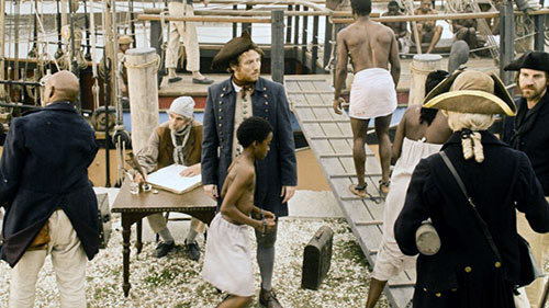 John Newton loads
                          cargo on slave ship