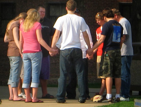 group praying together