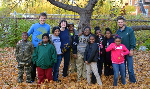 YouthWorks-Detroit staff and
                                youth outdoors