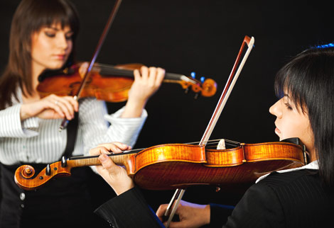 two violinists - bigstock.com image