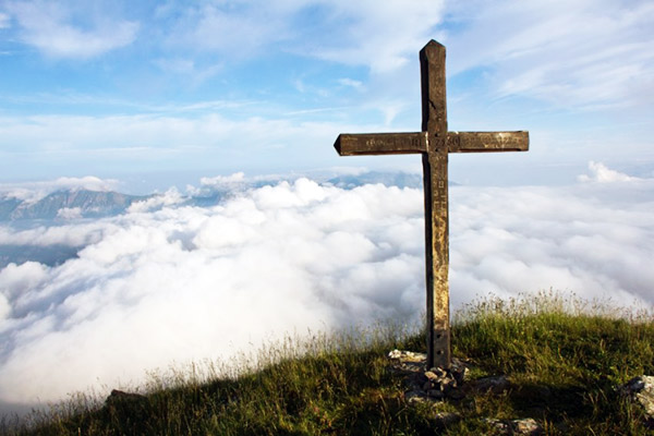 summit Cross on
                                                          mountain top
                                                          above the
                                                          clouds